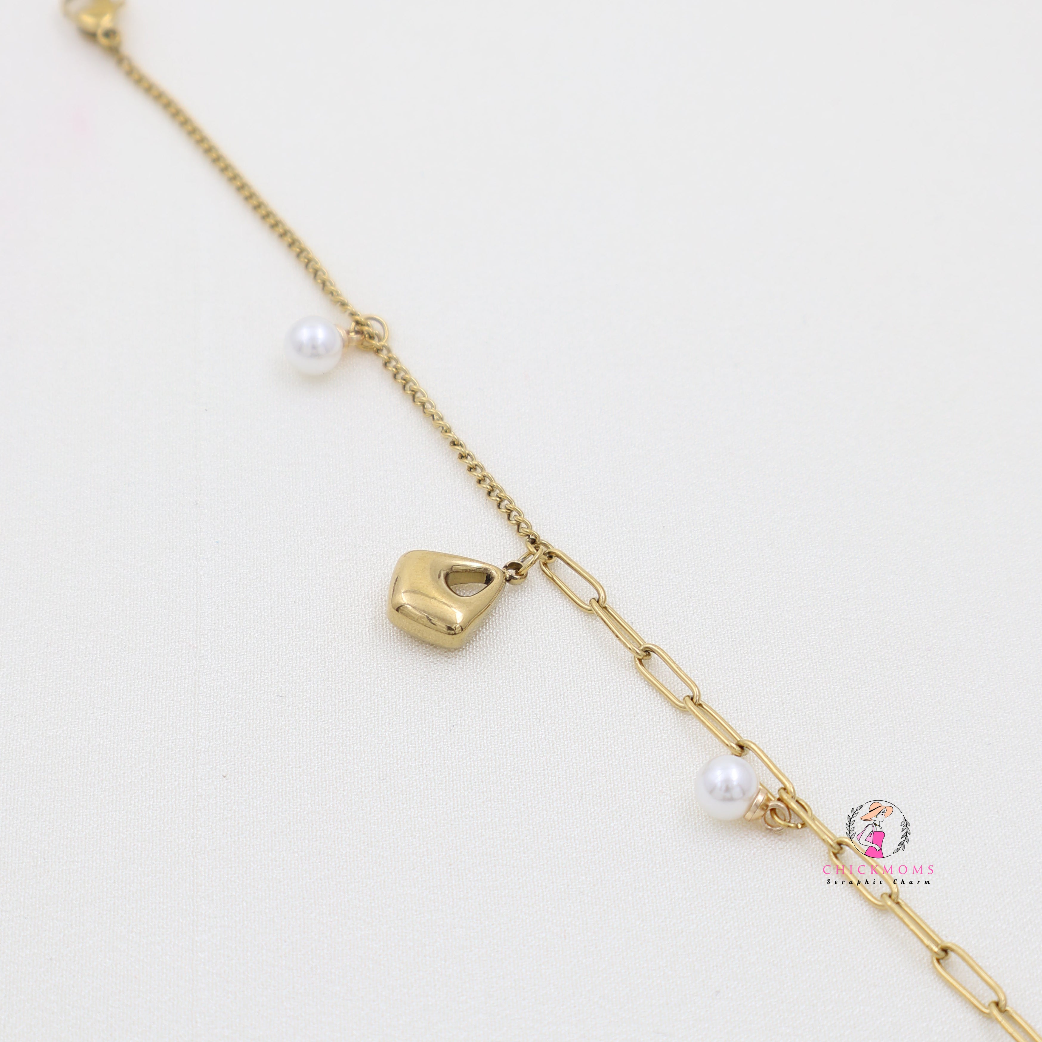 Elegant Gold Bracelet with Lock and Pearl Charms