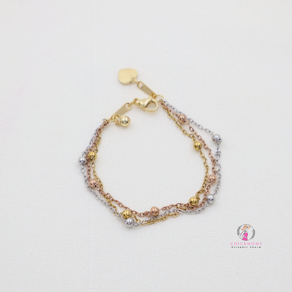 Elegant Multi Layer Triple-Tone Bracelet